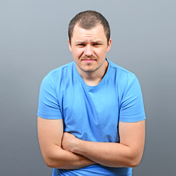Man suffering from stomach discomfort